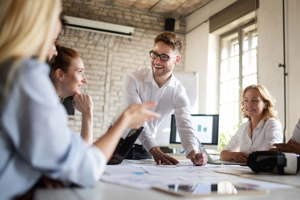 happy-creative-team-in-office-business-startup-des-K9DEN3B-2.jpg